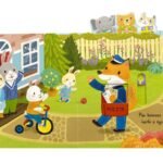 Wnetrze-ksiazki-z-ruchomymi-elementami-Wesole-zwierzaki.-Urodziny-przedstawiajace-kroliczka-na-rowerze-oraz-jego-rodzicow-machajacych-do-listonosza,-widoczny-ruchomy-element